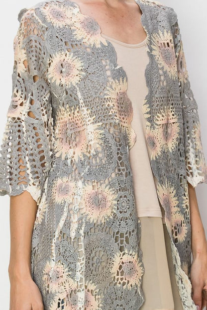 All crochet cardigan duster with black sunflower print.
