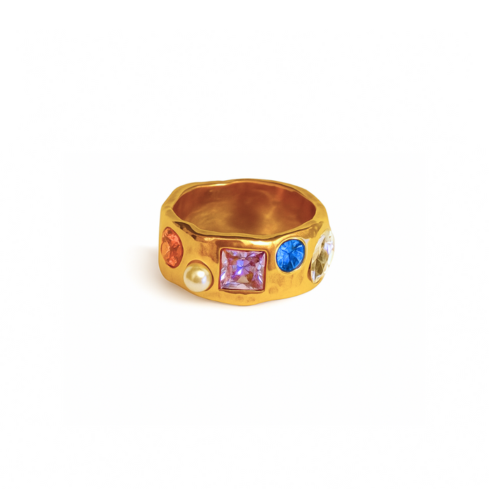 Chunky gold ring with a textured band, set with colorful gems and a single pearl.