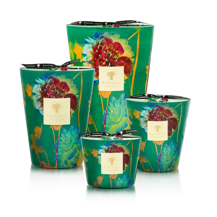 Set of four decorative candles with floral design on a white background