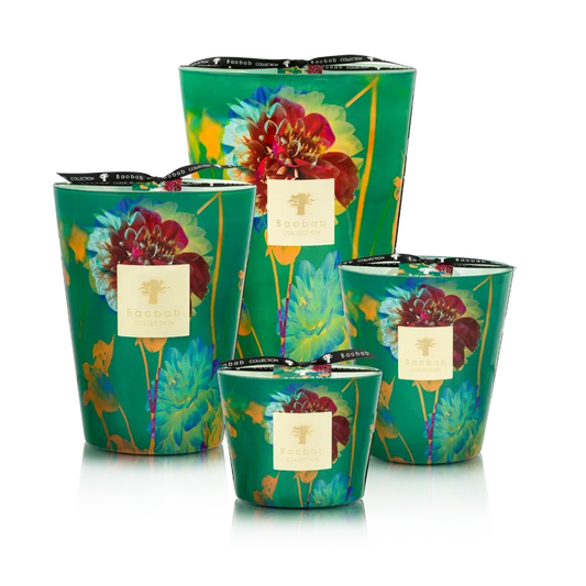 Set of four decorative candles with floral design on a white background