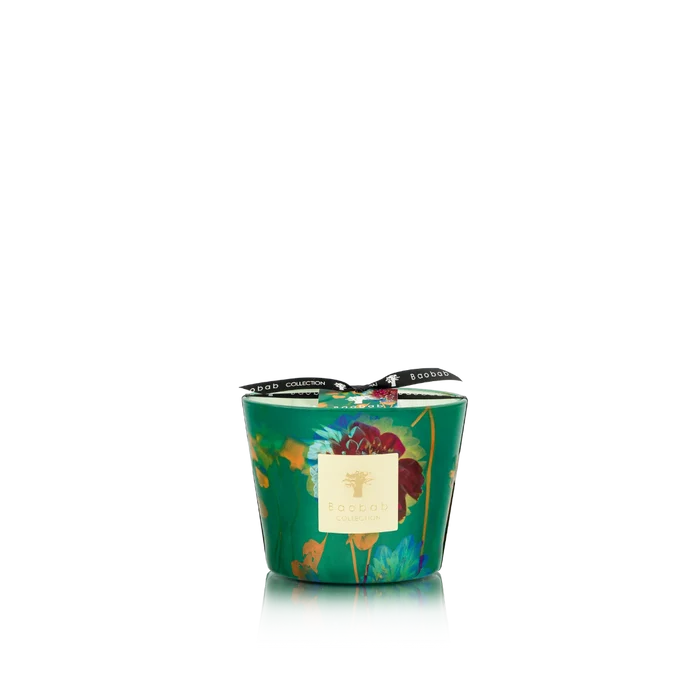 Decorative candle with floral design on a white background