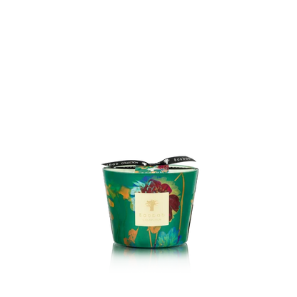 Decorative candle with floral design on a white background