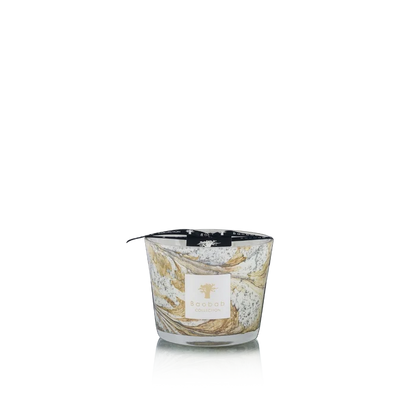 Candle with decorative hand blown glass on a white background