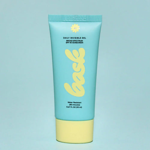 A Bask SPF 40 Face Sunscreen tube on a blue background.