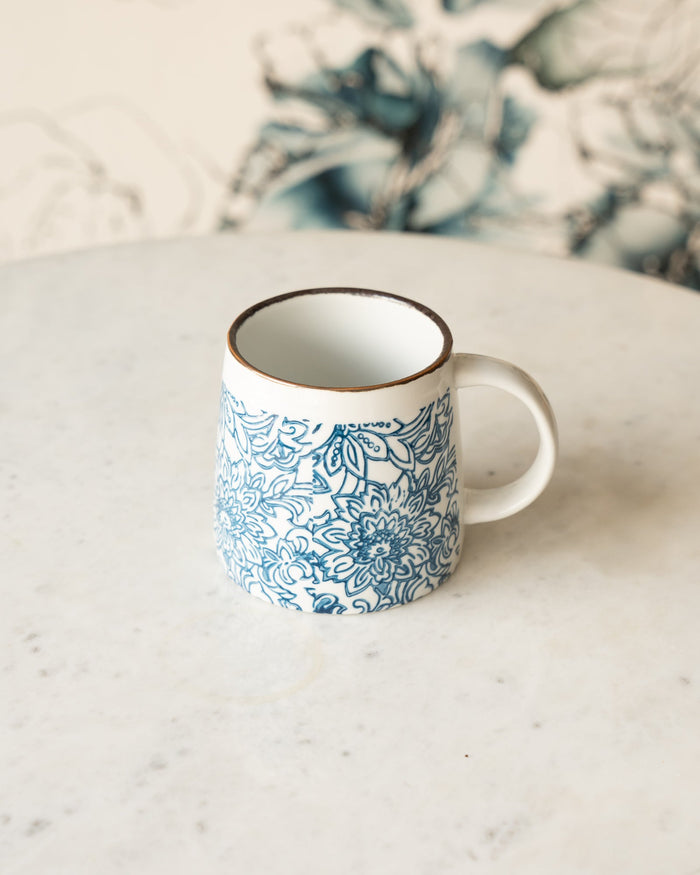maman x Creative Co-Op blue and white floral ceramic mug — vine pattern