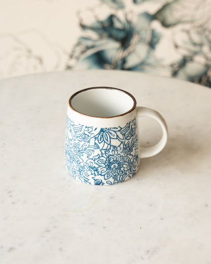 maman x Creative Co-Op blue and white floral ceramic mug — vine pattern