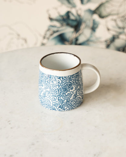 maman x Creative Co-Op blue and white floral ceramic mug — botanical pattern
