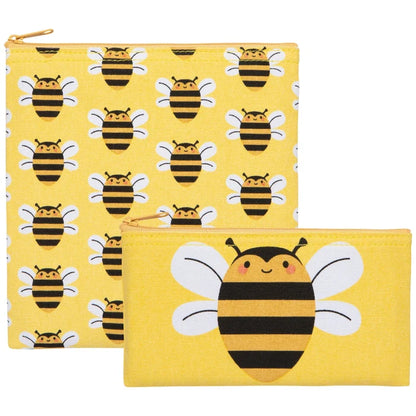 Two yellow pouches with bee pattern on a white background