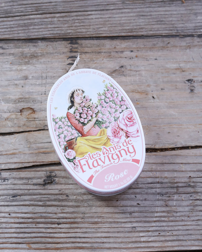 Tin rose mints with a decorative pink lid.