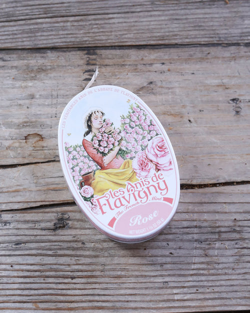 Tin rose mints with a decorative pink lid.