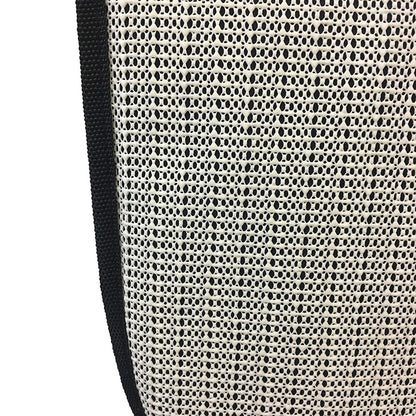 Close-up of the Nuby Car Seat Protector with Storage Pouch, showing its textured beige fabric and mesh-like pattern. A black edge borders the left side, while a non-skid back with small holes offers a netted look.