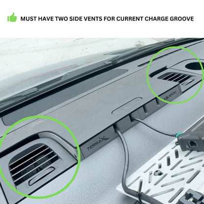 Dashboard-mounted charging system with cables and dual side air vents highlighted