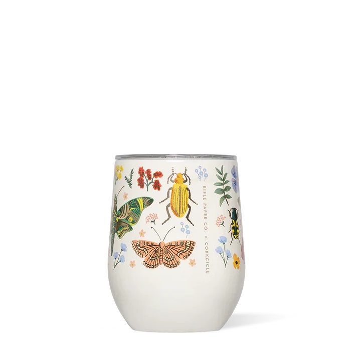 Stemless wine glass with insect and floral design on a white background