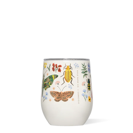 Stemless wine glass with insect and floral design on a white background
