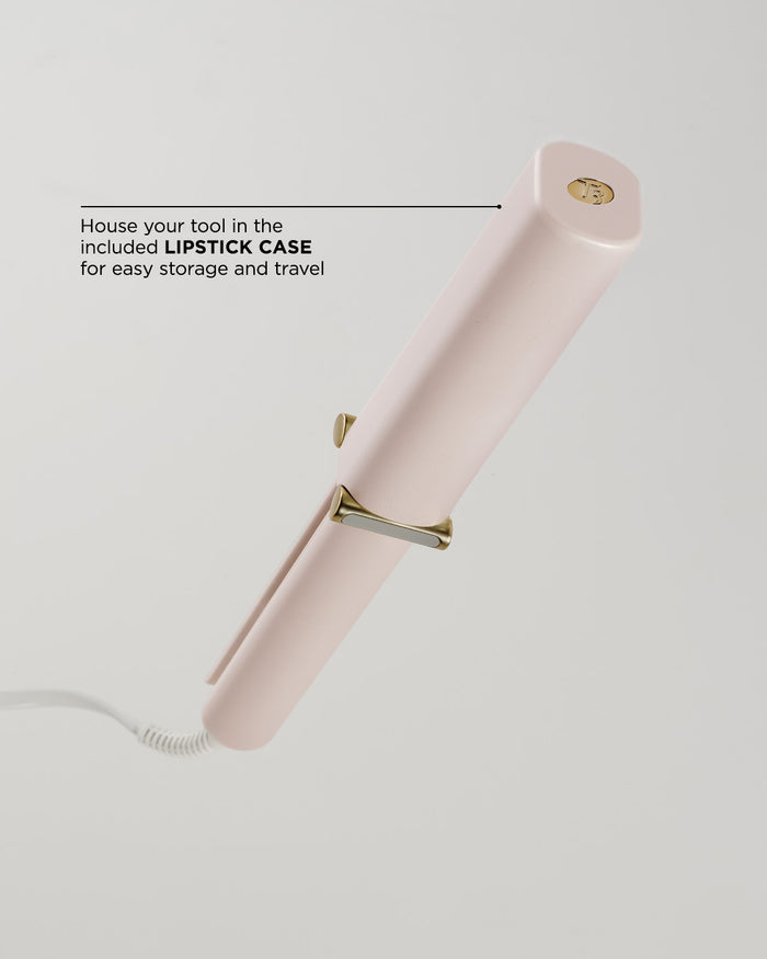 Pink hair straightener with text about storage case on a light gray background