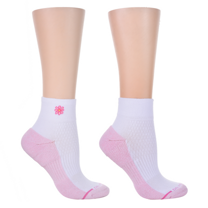 Quarter-length compression socks in white with pink accents and a flower design on the cuff.