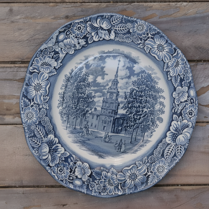 maman dinner plate — blue floral pattern with landscape center on white background