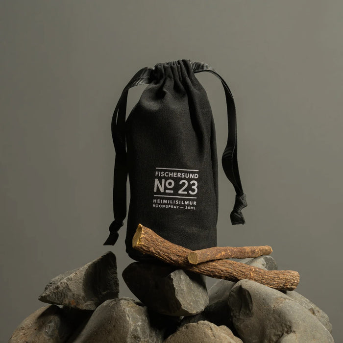 Black drawstring bag with 'Fischersund No 23' branding on rocks and sticks.