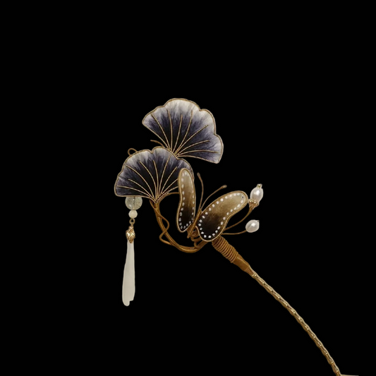 Close-up of gradient blue ginkgo leaves and butterfly details on traditional Chinese Ronghua hairpin