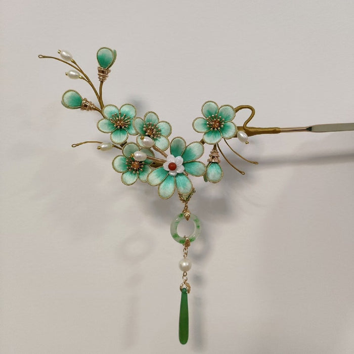 Handmade Ronghua turquoise plum blossom velvet flower hairpin with natural mulberry silk, gold wire, pearls, and green jade tassel