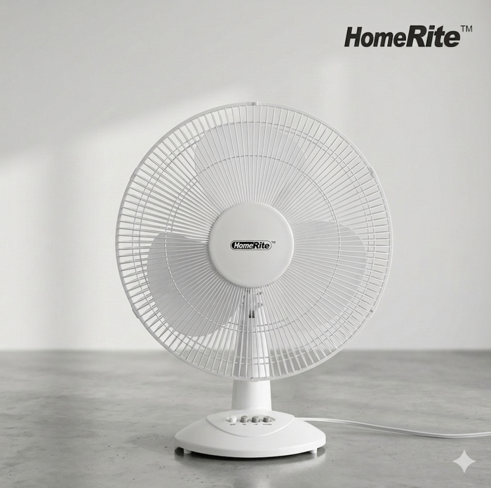 White HomeRite table fan on a gray surface with a light gray background
