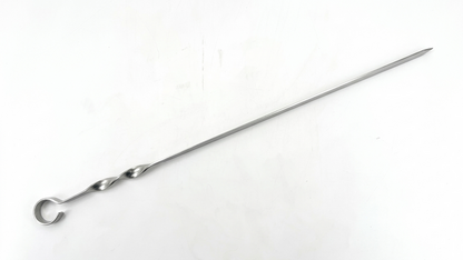 Metal skewer on a white background