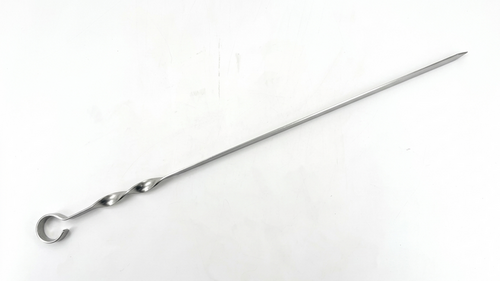 Metal skewer on a white background