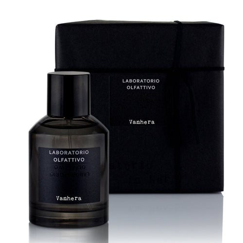 A black bottle of Vanhera 100ml Eau de Parfum with a dark vanilla fragrance, accompanied by its black packaging box with the brand name and product title visible.