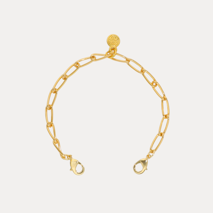 Link Chain Bracelet featuring elongated paperclip-style links and dual lobster clasps for effortless sophistication.