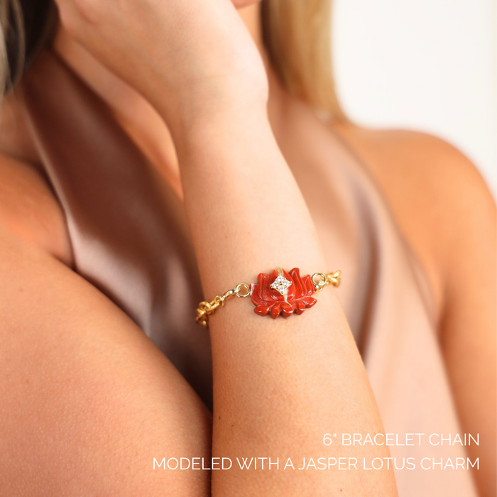 Loop Chain Bracelet adorned with a vibrant jasper lotus charm on a model's wrist, showcasing intricate details.