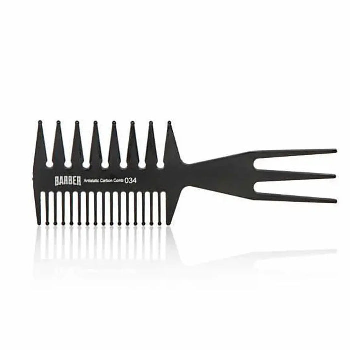 “Marmara BARBER Wide Tooth Comb Nº 034 held by a barber, showing its sturdy build”