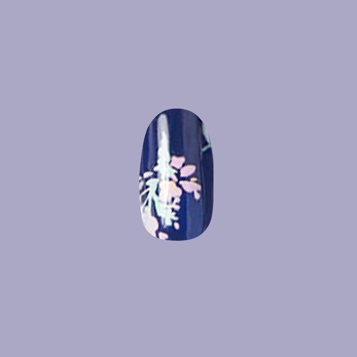 Micro Floral - Press-On | Short | Round navy false nail with delicate light floral design for an easy at-home manicure