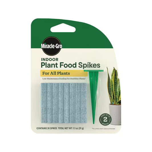Package of Miracle-Gro indoor plant food spikes on a white background