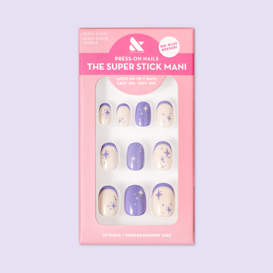 Mixed Purple Sparkle | Extra Short | Round - Tab Press-On nails with violet and glitter French design in pink packaging