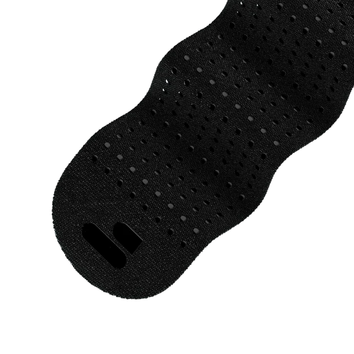 Nærbilde av svarte opphøyde prikker på Original Dot Band tekstil
