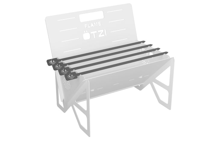 Black grill grates installed on a portable metal campfire stove frame