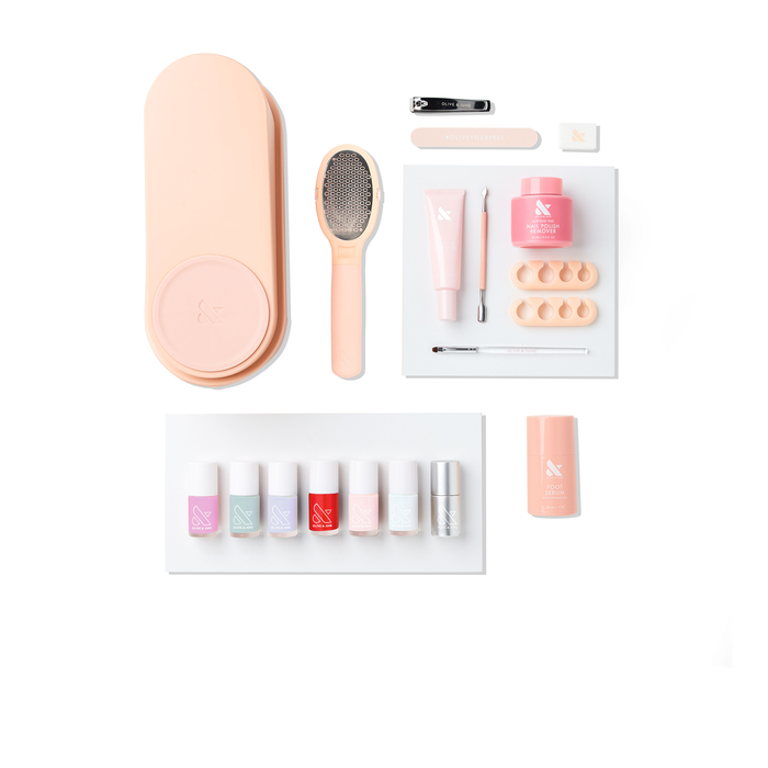 Pedi System - 6 Polishes featuring nail care tools, foot file, toe separators, and six colorful polish bottles for at-home pedicure