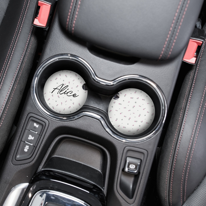 White car coaster with Alice and a ditsy floral pattern, shown with a matching floral cup holder liner.