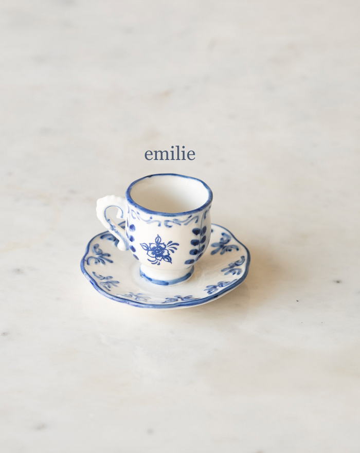 Tiny round tea cup and saucer with blue and white flower, "emilie".