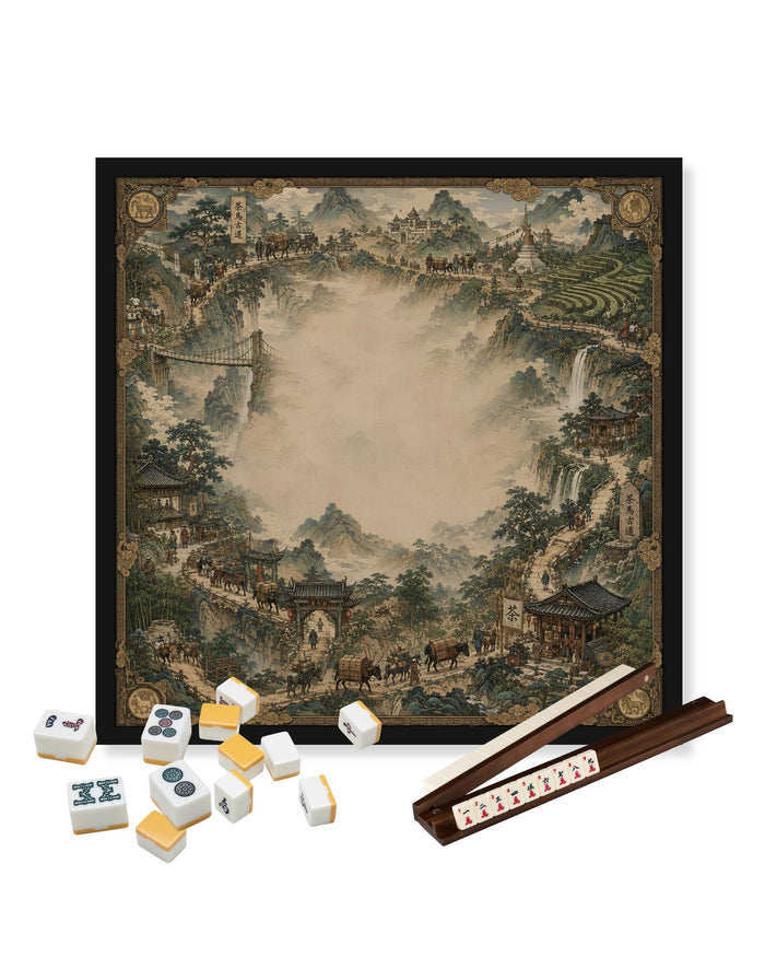 Square mahjong table mat with tea-road landscape print and black frame, used with tiles
