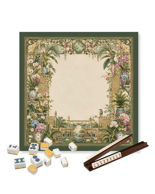 Square mahjong table mat with ornate garden trellis border; mahjong tiles on top.