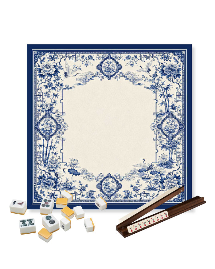 Blue-and-white square mahjong table mat with floral and bird corner details