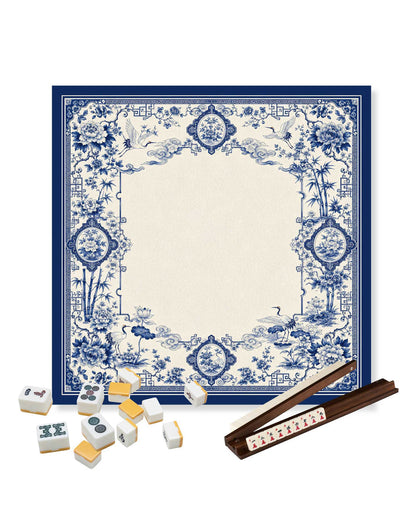 Blue-and-white square mahjong table mat with floral and bird corner details