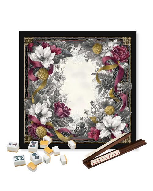 Square mahjong table mat with black border, white floral center, set of tiles and racks