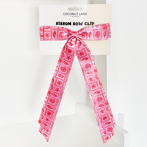 Coconut Lane Ribbon Bow Clip in Seashell Riviera, featuring a Mediterranean-inspired pattern and soft ribbon material.