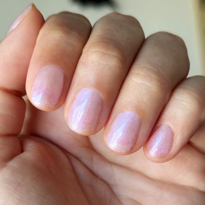 Rose Glaze - Builder Gel on short natural nails with subtle sheer pink shimmer in natural light close-up view