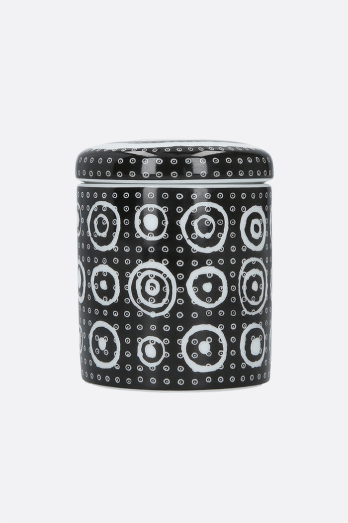 scented candle with cover