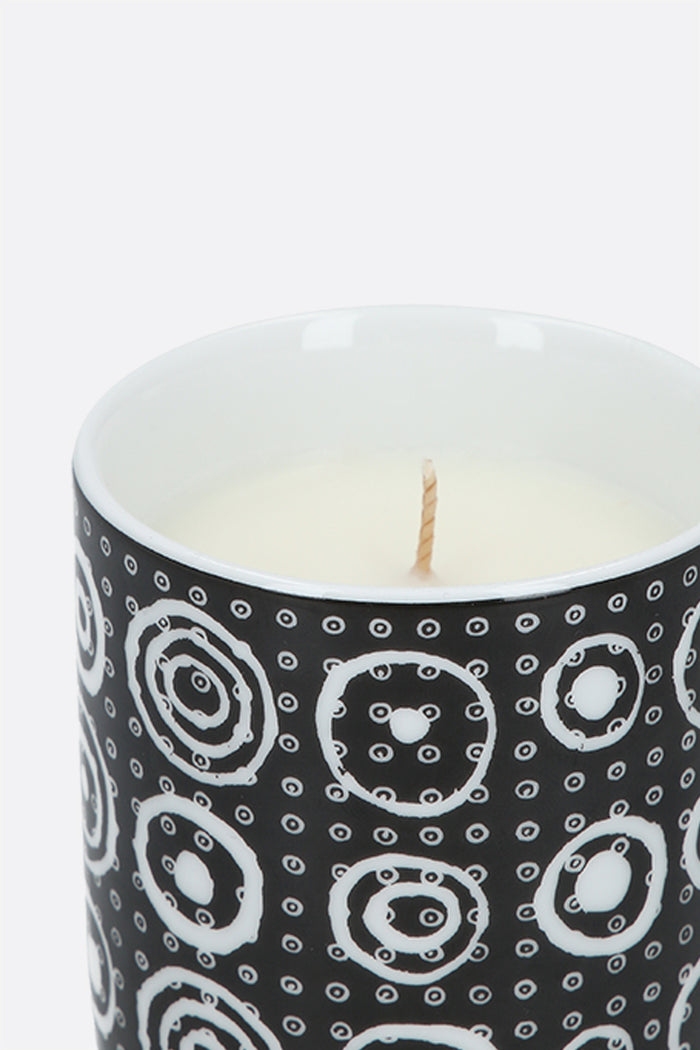 scented candle with cover