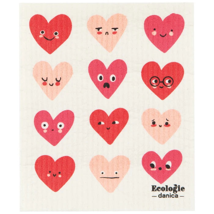 Patterned towel with cartoon hearts and 'Ecologie danica' branding.