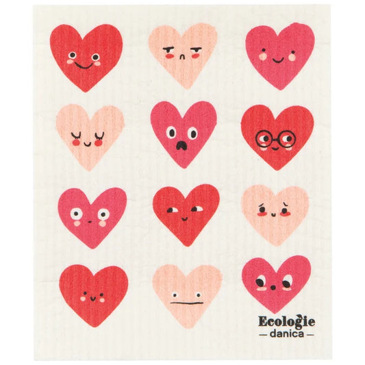 Patterned towel with cartoon hearts and 'Ecologie danica' branding.